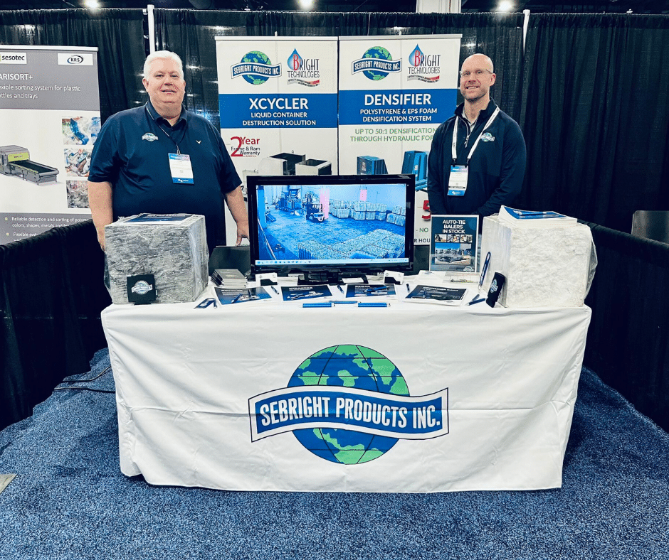 Thomas Orlandi & Tony Sharp at Sebright Products booth at the a waste management event, Plastics Recycling Conference.